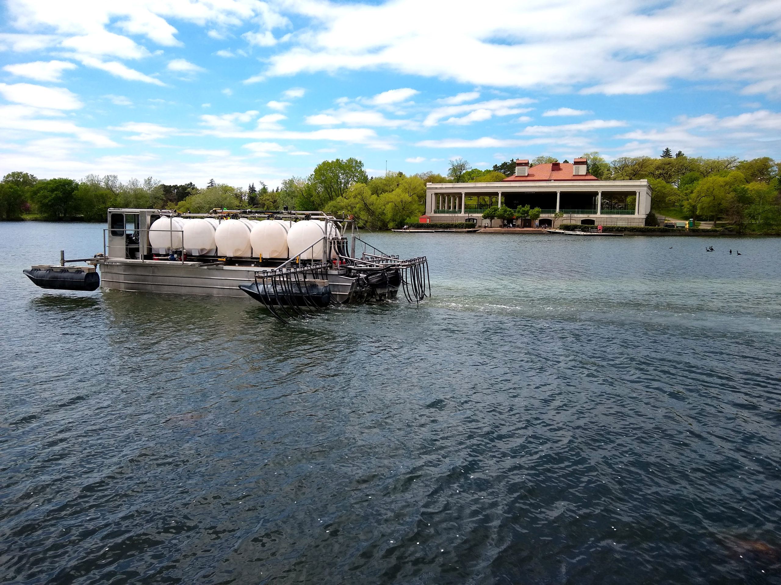 Boat applying alum to Como Lake in Saint Paul, Minnesota.