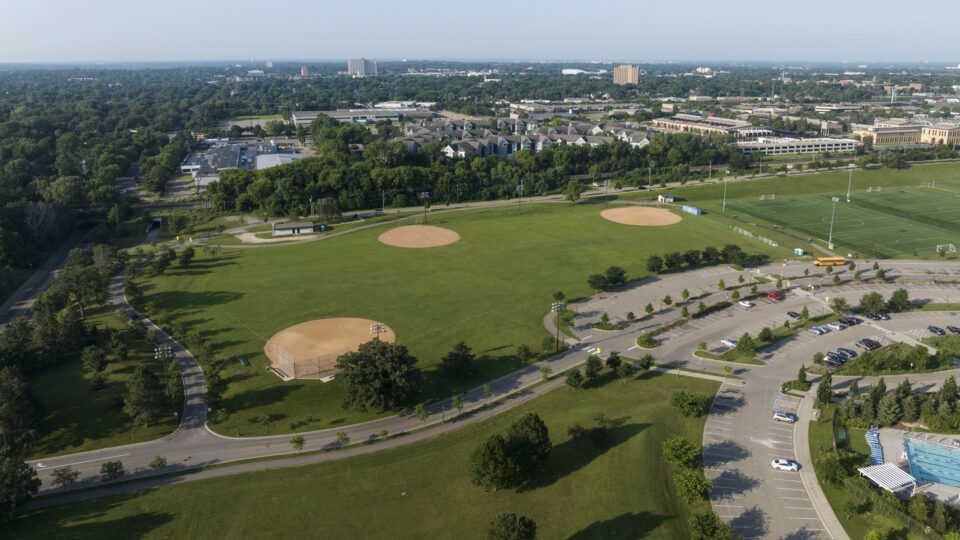 An aerial view of a large park with multiple baseball and soccer fields.